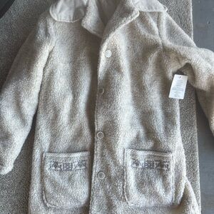 Women’s Reversible Cream Sherpa Puffer Coat with Embroidered Pockets